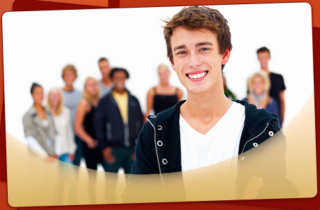 stock photo of a boy standing in front of a group of people